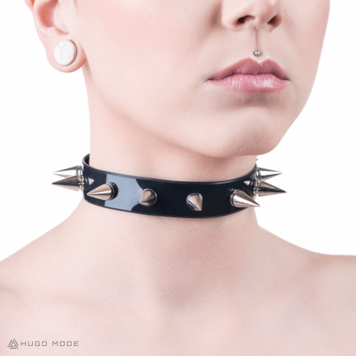 A choker necklace with small metal spikes.
