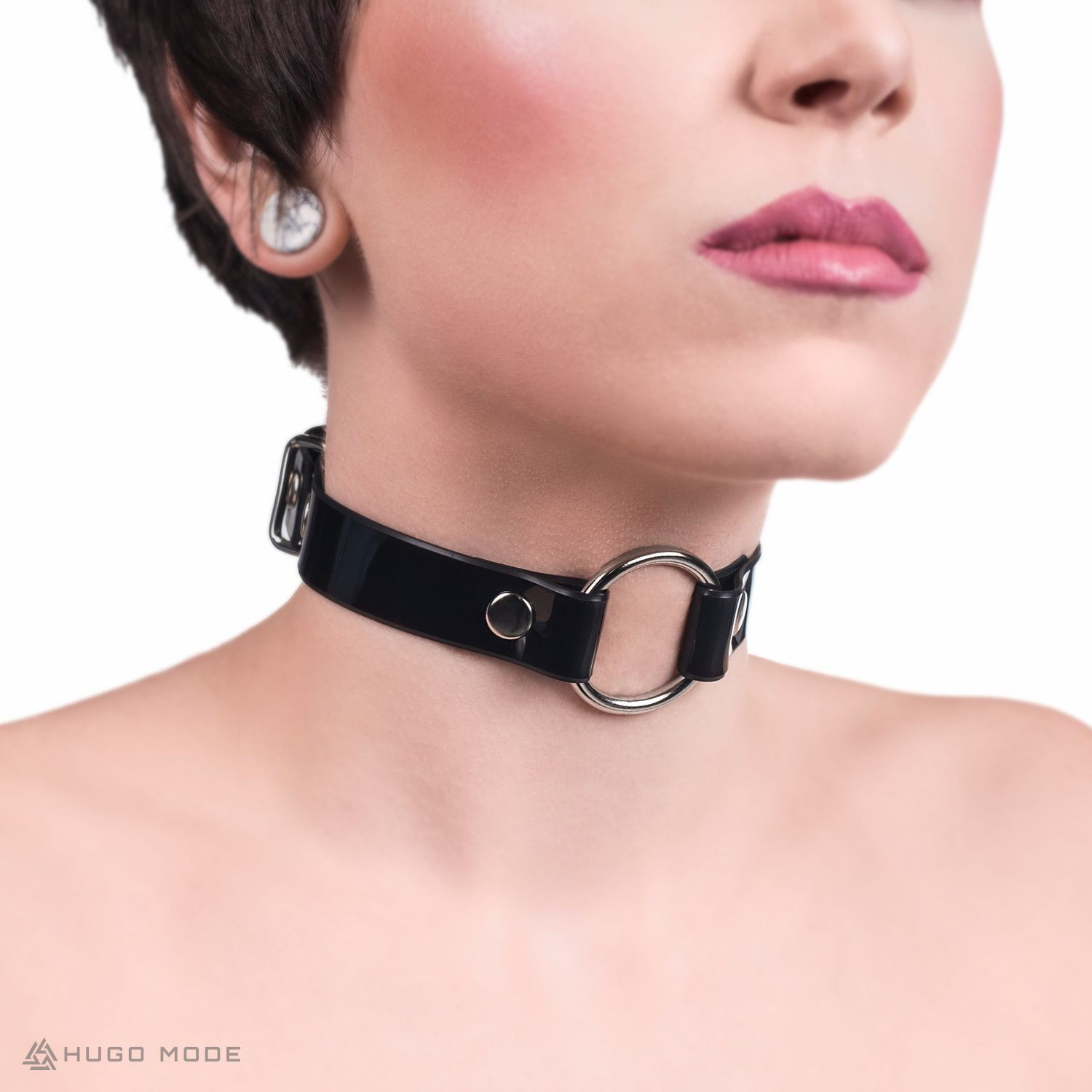 A choker with a ring in the front.